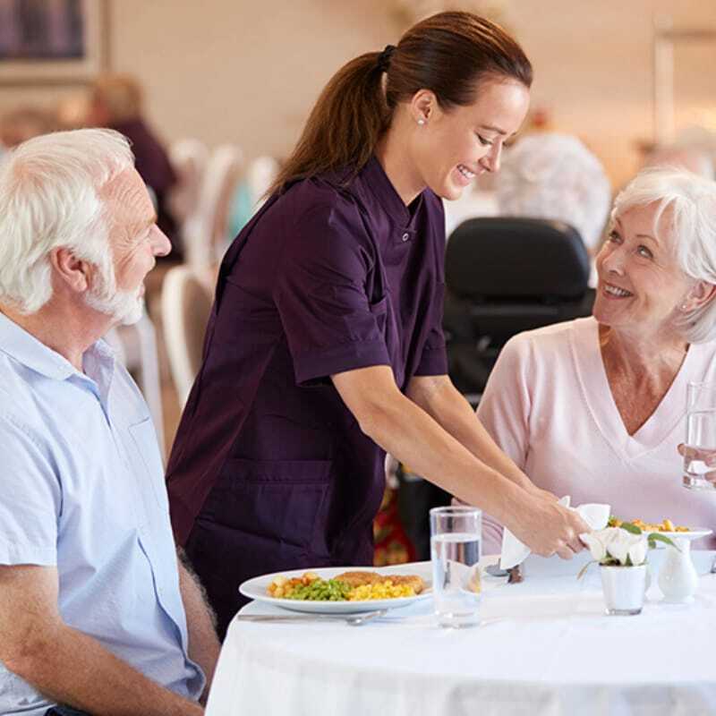 two seniors dining